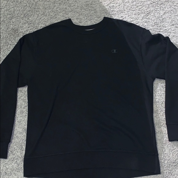 A black champion sweater. - Picture 1 of 4